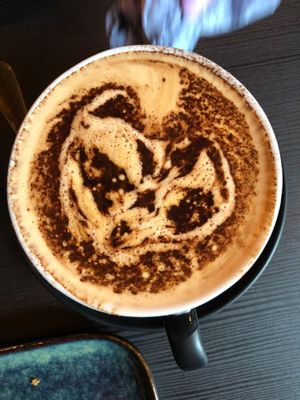 Oat latte with a face! at Oscar's Cafe in St Neots