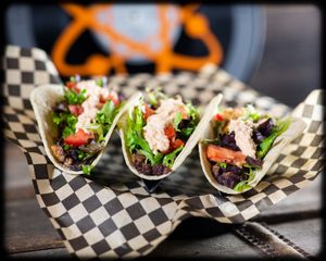 Sriracha Vegan Tacos.  Seasoned Black Beans and Walnuts topped with fresh lettuce and cucumber and our house made sriracha cashew cream. at The Atom Bistro and Coffee Bar in Glide