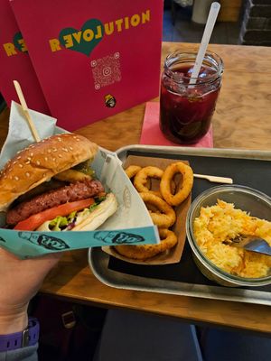 Power burger, onion rings, and coleslaw at Urban Gorillas - Vegan Revolution in Dusseldorf
