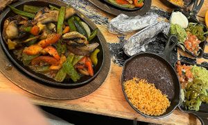 Mushroom fajitas and sides   at Mad Dog & Beans Mexican Cantina - Pearl St in New York City