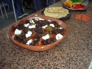 Bulgar, Spinach and leeks with tomatos caramelised with brown sugar and Harrisa, with Lebna cheese made from Greek yogurt and Humous at Karen's Kitchen Troviscais Odemira in Troviscais