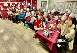 Another chocolate, making class where they make chocolate, covered, strawberries, truffles, and bark at Chamberlains Chocolate Factory and Cafe in Roswell