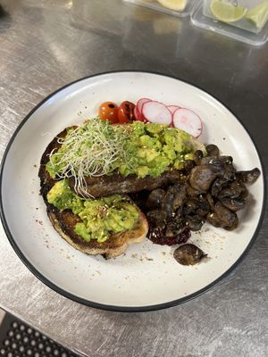 Smashed avo (no feta) with mushrooms   at The Deck Bar in Darwin