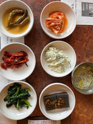 Several ban chan (side dishes), all delicious, & bean sprout soup that looked simple but was also tasty at Hankook Jib  in Jeonju