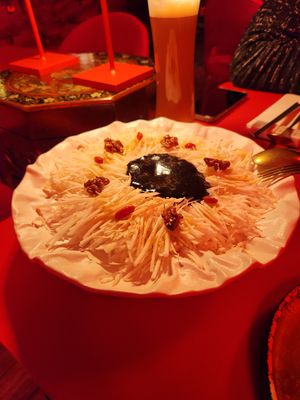 Napa cabbage with black sesame sauce, candied walnuts, goji berries. The HIGHLIGHT of our visit, what a delicious salad, perfect balance of salty, fresh, sweet, crunchy. Will crave it and try to make at home. at Green Light District 红灯区 in Dusseldorf
