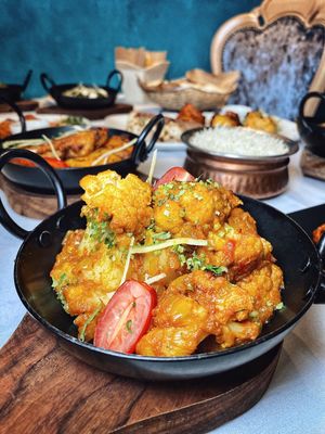 Gobhi Aloo - Vegan 
Cauliflower and new potatoes cooked with fresh coriander and royal cumin at Infuse Modern Indian Bistro in St Albans