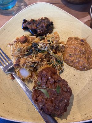Selection of vegan curries and onion bhaji  at Infuse Modern Indian Bistro in St Albans