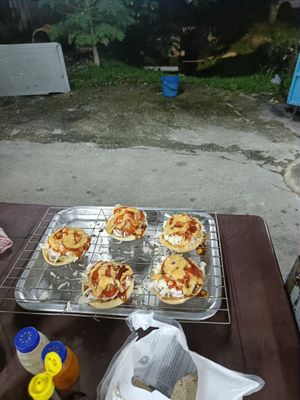 Burgers being made at Tina's Kitchen - Food Stand in Ipoh
