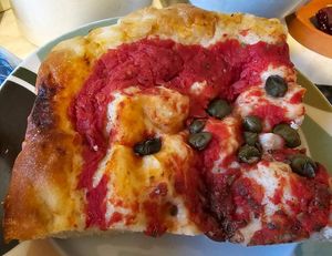 Pizza with home made mozzarella and capers at Pomodoro E Basilico  in West London