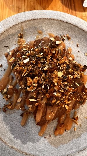 Almond cake with quince coulis and almond praline .  at La Belle Verte in Toulouse