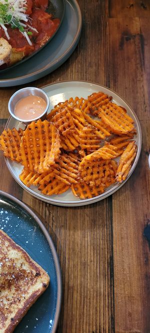 Waffle fries + delicious sauce at The Ginger Mule in Houston