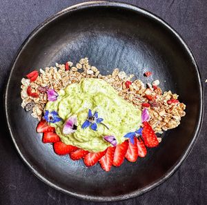 Cheesecake deconstruction with cereal, avocado an lemon at Tribu de Fuego in Bogota