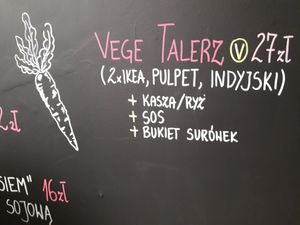 Vegan platter: includes 3 salads,  rice or kasza and 3 samples of their signature dishes. Big portion! at Karrotka in Torun
