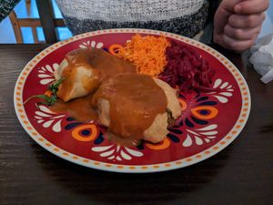 Indian dumplings with paprika sauce at Karrotka in Torun