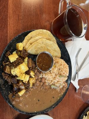 I forgot what this is called but it’s from the weekend brunch menu! Also pictured is an Americano   at Penelope's Vegan Taqueria - Andersonville in Chicago