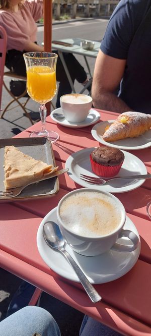 Pumpkin quiche, chocolate muffins and croissant with cream. at Flora et Labora in Milan