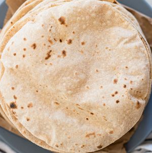 Roti is an unleavened flatbread made of whole wheat flour, ghee. at Jagdish Farshan in Irving