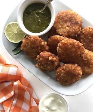 Sabudana vada is a crispy Indian snack made from soaked tapioca pearls mixed with mashed potatoes, peanuts, and spices, formed into patties and deep-fried until golden brown. at Jagdish Farshan in Irving