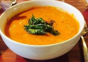 Tomato chutney is a tangy and spicy condiment made from fresh tomatoes, red chili peppers, onions, and other seasonings, often served as a side dish with Indian meals. at Jagdish Farshan in Irving