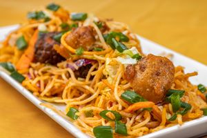 Chinese bhel is a crispy and tangy Indo-Chinese street food made by mixing fried noodles with vegetables, sauces, and spices, often served with a squeeze of lemon or lime.
 at Jagdish Farshan in Irving
