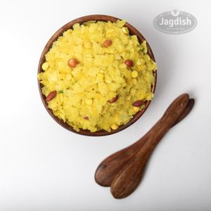 Nylon chevdo is a crispy and savory Gujarati snack made with thin flattened rice (poha), fried lentils, peanuts, and spices. at Jagdish Farshan in Irving