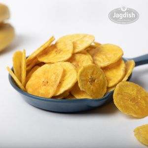 Banana chips are a popular snack made from sliced bananas that are deep-fried or dried until crispy and crunchy at Jagdish Farshan in Irving