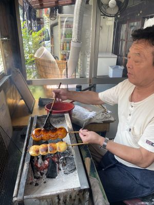 He asked me to photograph him doing this!  at Yaki Manju Shimamura in Gunma