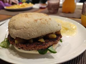 Seasonal "Pumpkin Spice" burger with potato salad at Das Delicious in Vienna