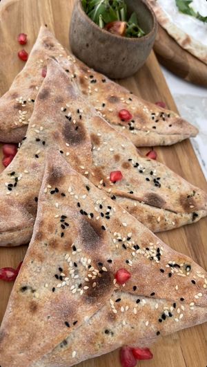 Teigtasche gefüllte mit Spinat, Granatapfelkernen, surprisingly very yummyyyy! at Sieben by Hanaa in Buehl