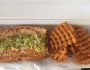 Kielbasa Vegan Dog with relish and mustard. Also seasoned waffle fries!! at Dreamy Weenies in New Orleans