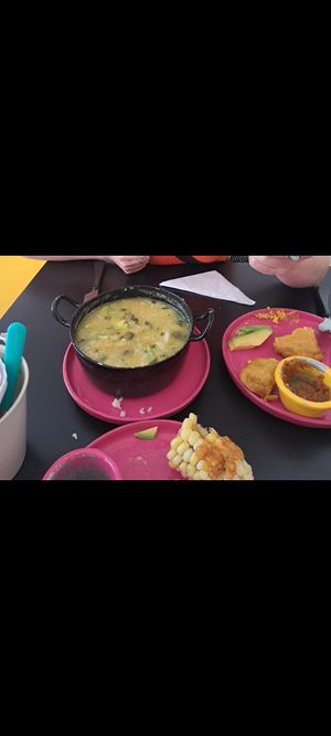 I can't remember the name but this was the waitress' recommendation. It was a broth with fake chicken where you put corn, avocado, rice in the pot. Pretty tasty! at María Candela  in Bogota