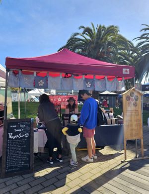 Booth at Grand Lake Farmer's Market at Mume Farm in Orland