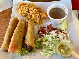 Vegan Flautas with accidental dairy cheese on the pico de gallo 😬  at Mr. Taco Cantina in Galveston