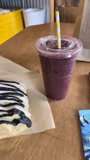 Choco croissant with berry kale smoothie  at Green Salmon Coffee and Tea House in Yachats