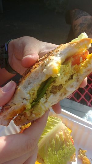 Sausage breakfast sandwhich with everything bagel at Green Salmon Coffee and Tea House in Yachats