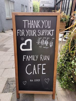 The drawing of the family is made by the daughter of the owner at Organic Deli Cafe in Oxford