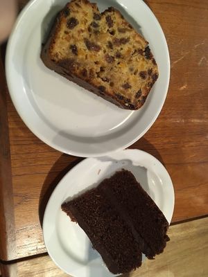 Fruit cake, chocolate cake at Organic Deli Cafe in Oxford