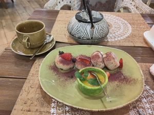 Buckwheat tea and coconut pancakes at Cafe Imbir - Ginger in Kyiv