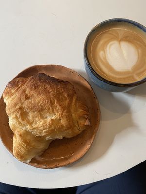 Croissant and cappuccino  at Full Bloom Café in Nice