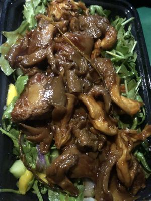 Mango salad and baked mushroom with coconut dressing   at Food For Negus in Brooklyn