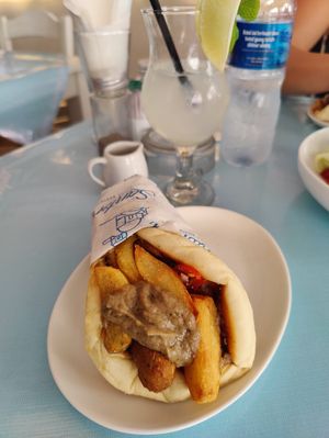The slovakipita with falafel and eggplant sauce at Santorini Greek Restaurant Kuta in Kuta
