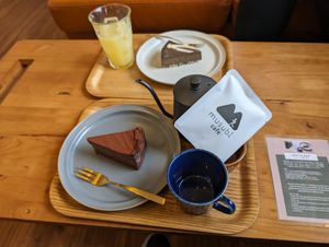 Chocolate tofu cake, seasonal Cake, apple juice and hand drip coffee set at Musubi Sweets Factory  in Kyoto