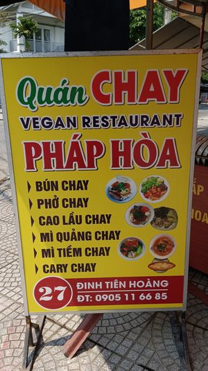 Sidewalk sign at Quan Chay Phap Hoa in Hoi An