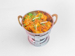 Bombay Potatoes ( Famous potatoes in cubes coooked in spices and onion and cumin) Vegan at Bombay Palace Indian Restaurant in Alicante