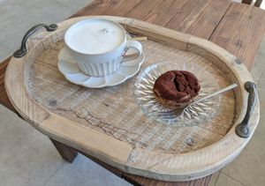 Latte and small cake at On-Ve Vegan Bakery 온비 비건베이커리 in Gyeongju