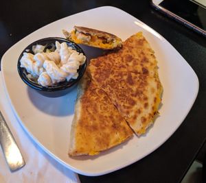 Spicy "chicken" Quesadilla with the FAMOUS pasta salad (nostalgic- reminded us all of home made picnic pasta salad) at The Flaming Icecube Cafe in Boardman