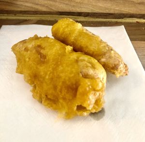 Battered sausage   at Village Fish & Chip Shop in Manchester