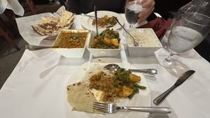 Chana masala on the left, Aloo Ida Seemi Ko Tarkari in the middle  at Nepal House in Chicago