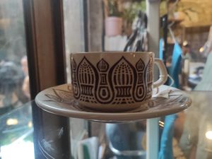 Vintage mug at Musubu Cafe in Porto