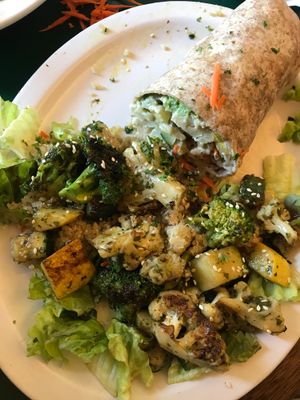 This is two entrees combined into one (we shared) one was the veggie wrap and the other was a grilled veggie salad at East West Cafe in Sebastopol